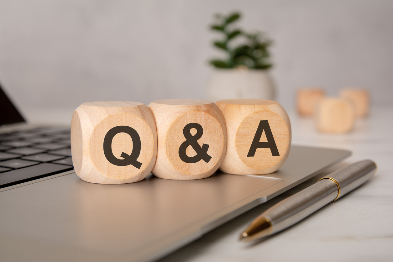 Three wooden blocks that read "Q & A"