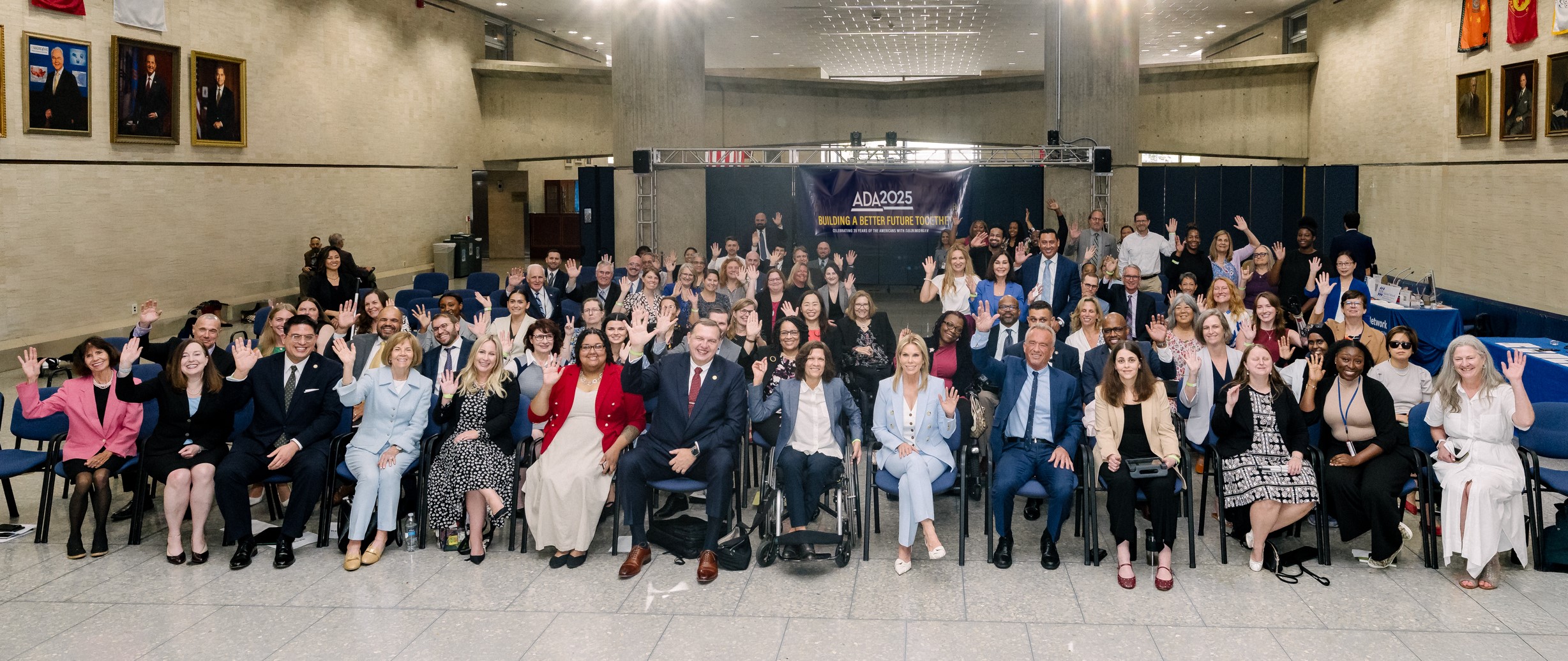 Group photo of the audience and speakers, including HHS Secretary Robert F. Kennedy Jr  and ACL's Acting Administrator and Assistant Secretary for Aging Mary Lazare, at the ADA 35th Anniversary event