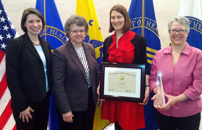 Assistant Secretary for Aging Kathy Greenlee (2nd from left) with Amy Wiatr-Rodriguez (3rd), Kate Gordon (1st) and Jennifer Watson (4th) during the HHS Innovates Awards. The Connecting to Combat Alzheimer’s team won the People’s Choice Award!